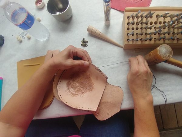 Leather tooling created by an IHEA leatherwork student