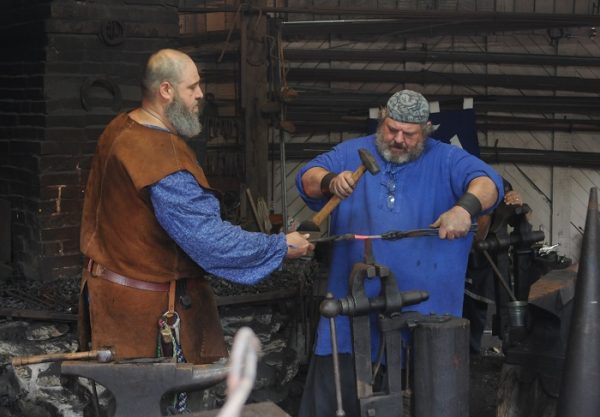 IHEA Blacksmiths working together